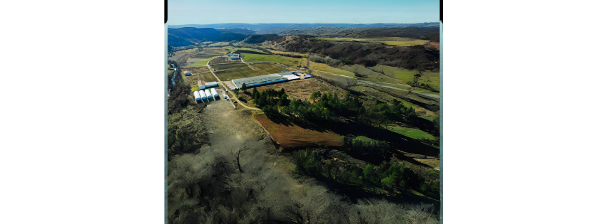 Aerial view of the Euro Mushrooms facility and surrounding agricultural landscape
